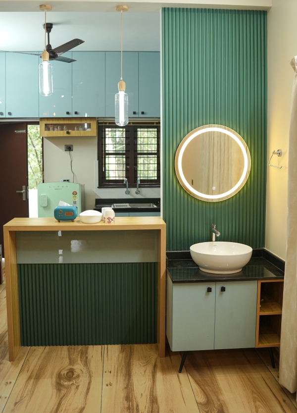 Breakfast and wash counter setup with granite top at Peyad, Thiruvananthapuram